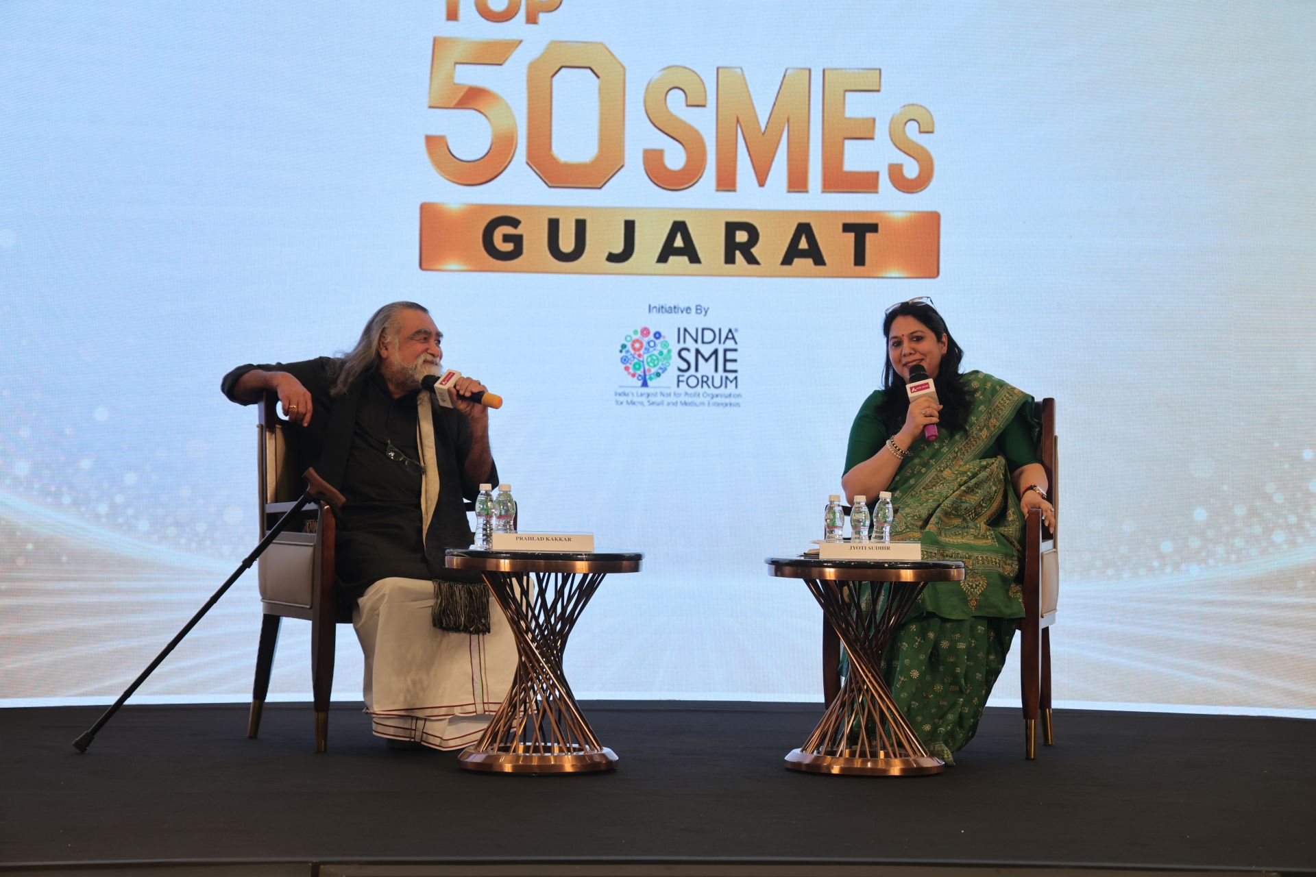 Winners on stage at the Top 50 SMEs Gujarat Awards ceremony